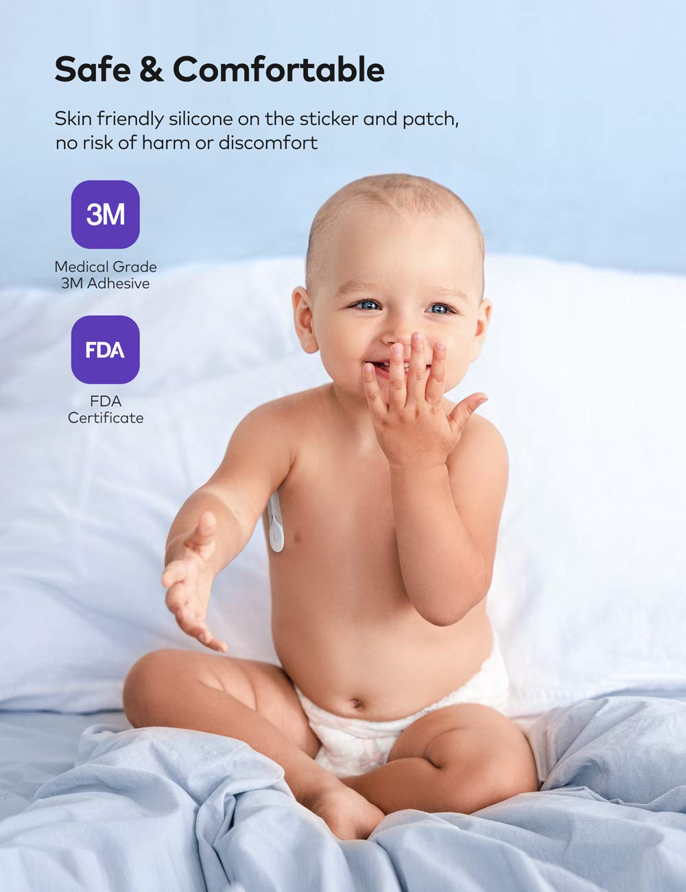 Baby smiling with VAVA thermometer patch on armpit