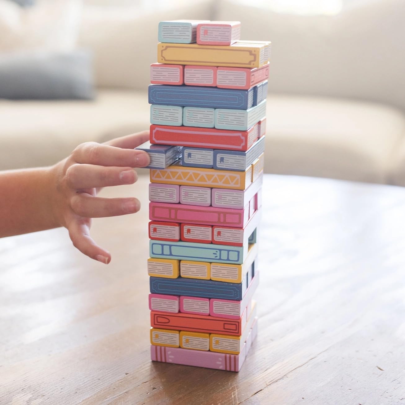 Pippi Post Tumbling Book Stack Game, Wooden Blocks with Colorful Spine Design, 51 Pieces, Classic Stacking Tower Game for Bibliophiles