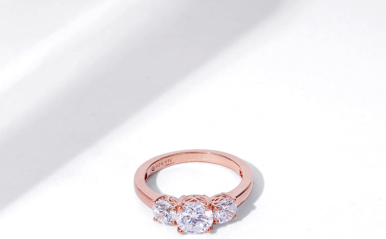 Amazon Essentials Rose 18K Gold Plated Sterling Silver Round 3-Stone Ring made with Infinite Elements Cubic Zirconia (3 cttw), Size 7, (previously Amazon Collection)