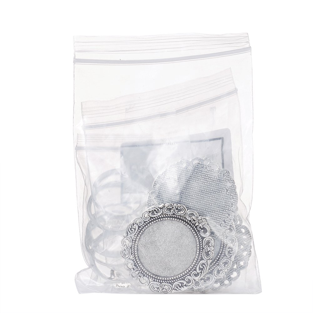 Supports de lunette cabochon de pendentif en alliage de style tibétain en gros pour création de bijoux Supports de lunette cabochon de pendentif en alliage de style tibétain en gros pour création de bijoux
