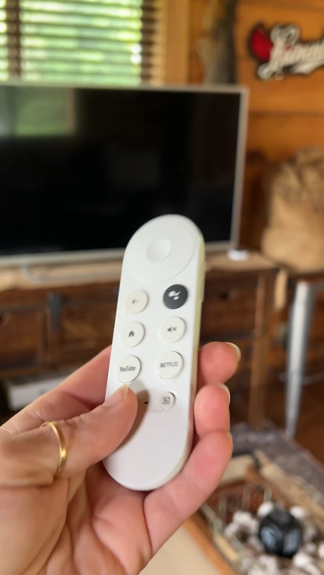 Google Chromecast connected to TV