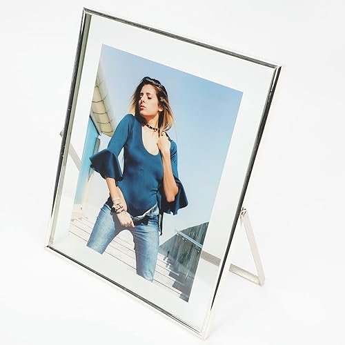 AhaGo Marco flotante plateado (8 x 10 pulgadas, vertical), para tamaños de imagen (7 x 9, 6 x 8, 5 x 7), marco de fotos de estante de mesa, estilo