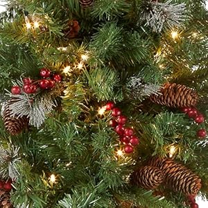 National tree company pre lit artificial mini christmas tree green crestwood spruce white lights decorated with pine cones berry clusters frosted branches includes pot base 4 feet  urban country home decor