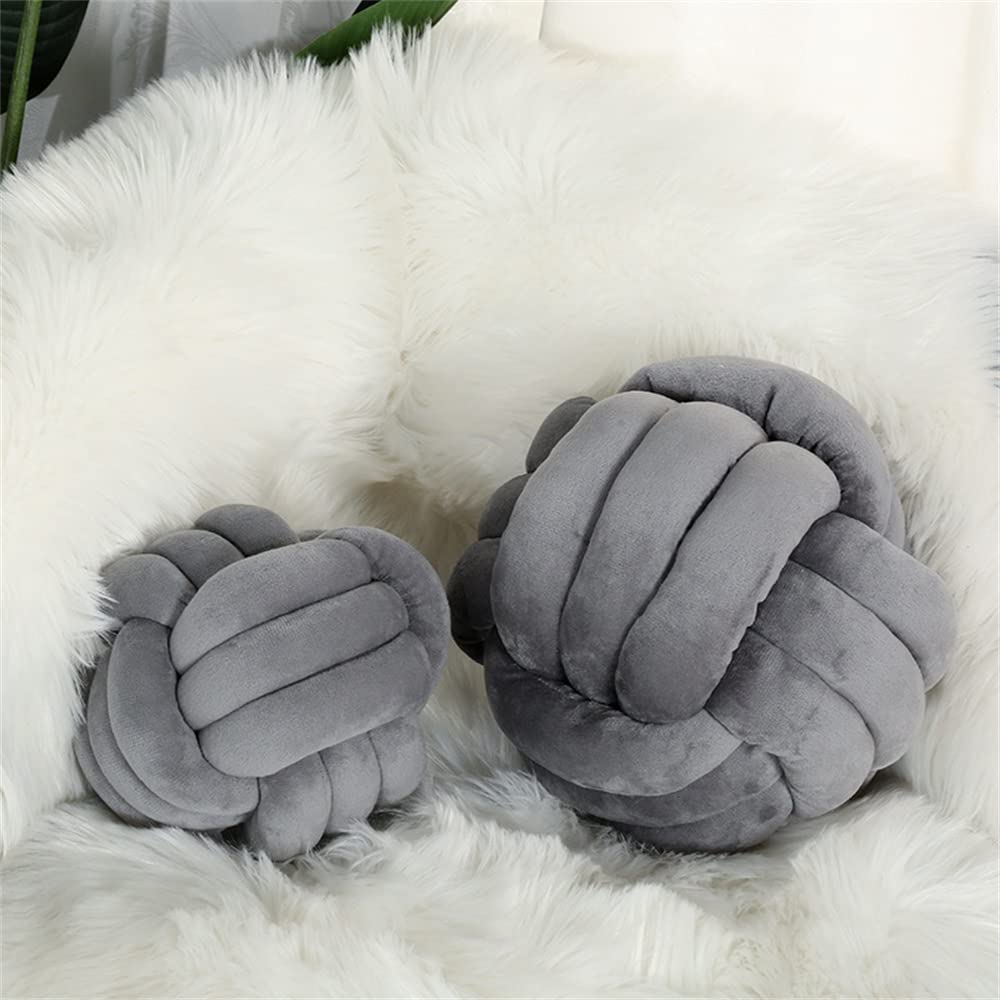 Oreillers noués à la main pour créer un cocon cosy dans votre chambre
