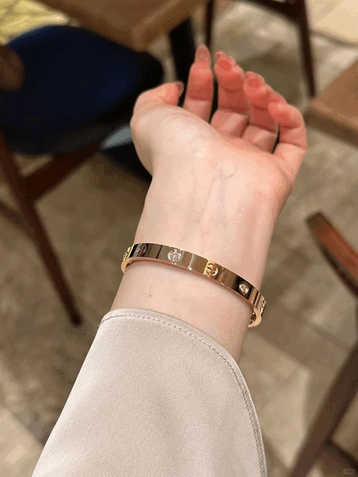 Image of Luxury Gold-Plated Bangle Bracelet with Crystal Accents, Minimalist Design, Screw Pattern Detail