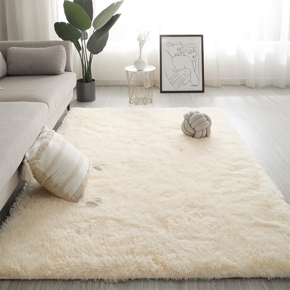 Tapis de salon shaggy en blanc cassé au design moelleux et chic