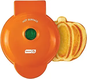 DASH DMWP001OR Mini Maker for Individual Waffles, Hash Browns, Keto Chaffles with Easy to Clean, Non-Stick Surfaces, 4 Inch, Orange Pumpkin