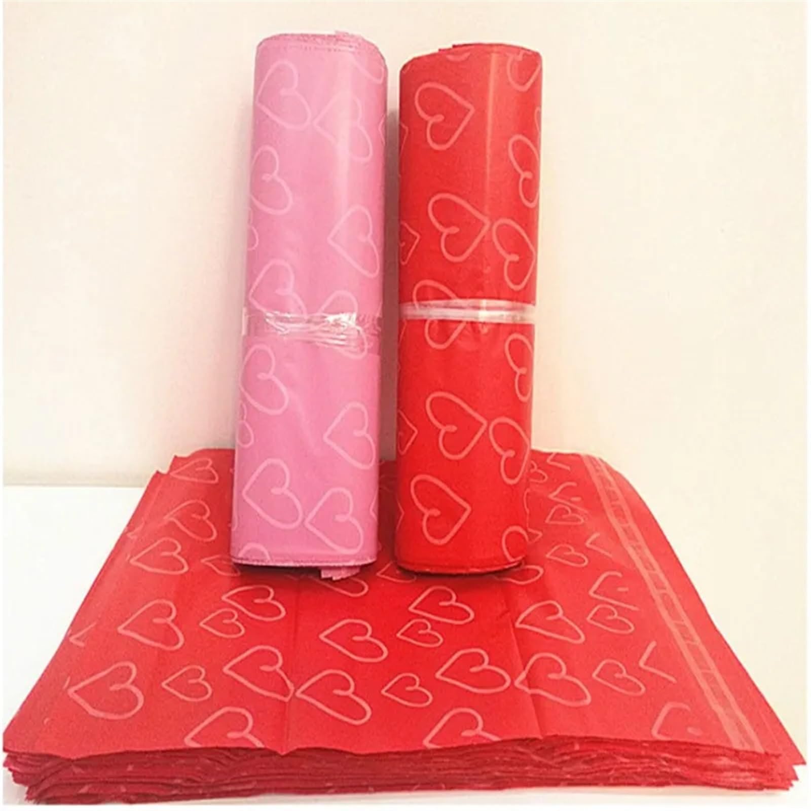 Buste Per Spedizioni 50 Pz/lotto Grandi Sacchetti di Corriere Smerigliato Rosa Modello di Cuore Sacchetto Adesivo Autosigillante Materiale Opaco Busta Mailer Sacchetto di Spedizione Postale(Pink,45x60