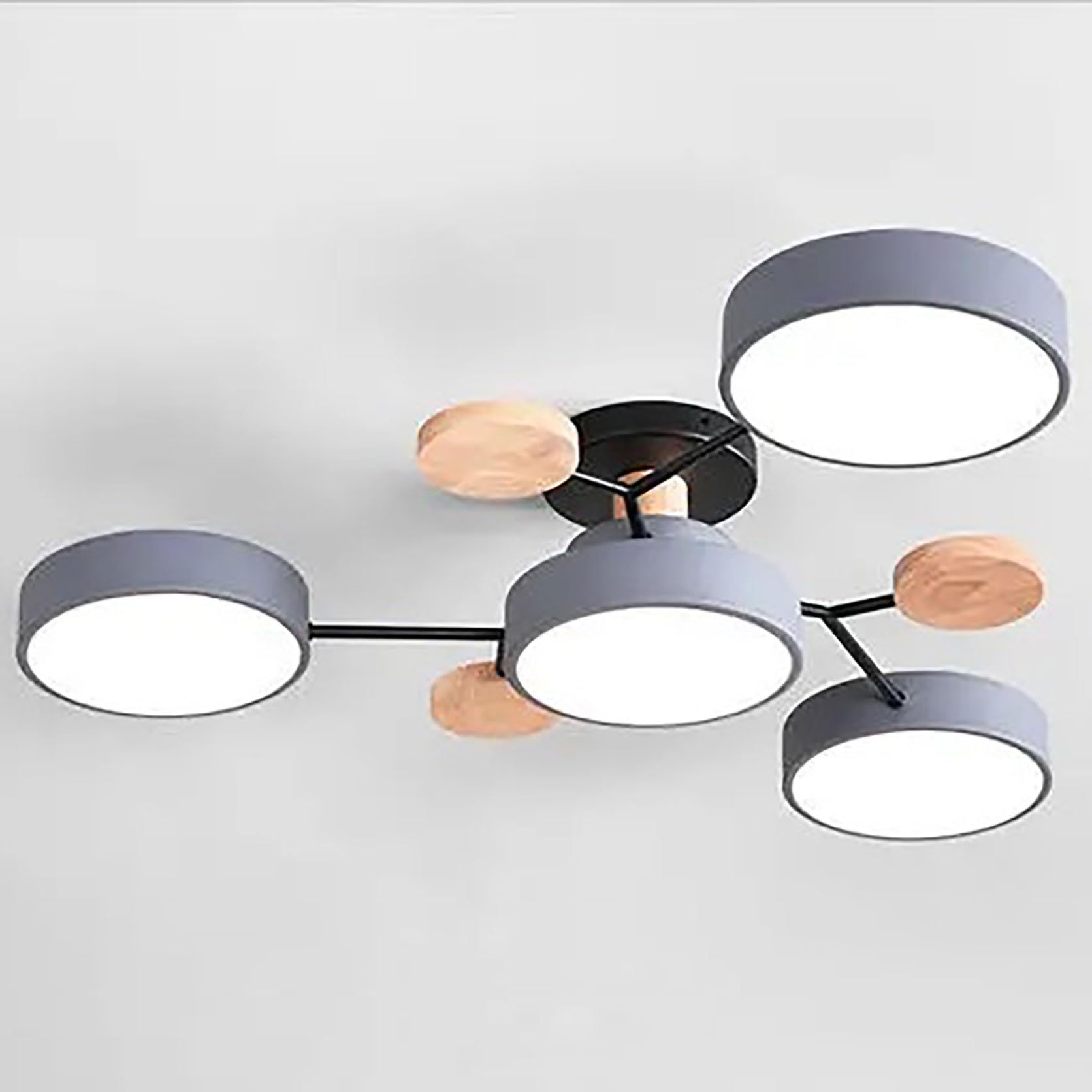 Plafonnier LED dimmable pour en finir avec la lumière agressive du salon