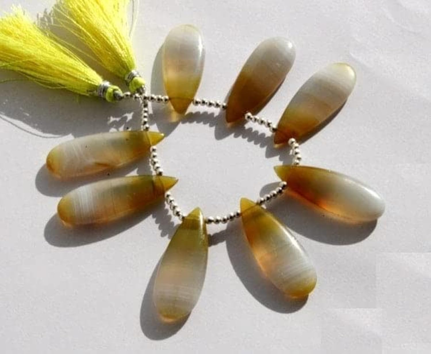 Calcédoine jaune naturelle poire allongée 34x12mm pour fabrication de boucles d'oreilles