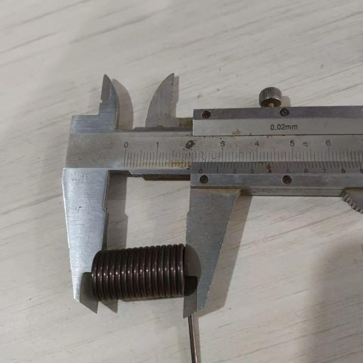 Molle di compressione, Molla della seminatrice a becco d'anatra