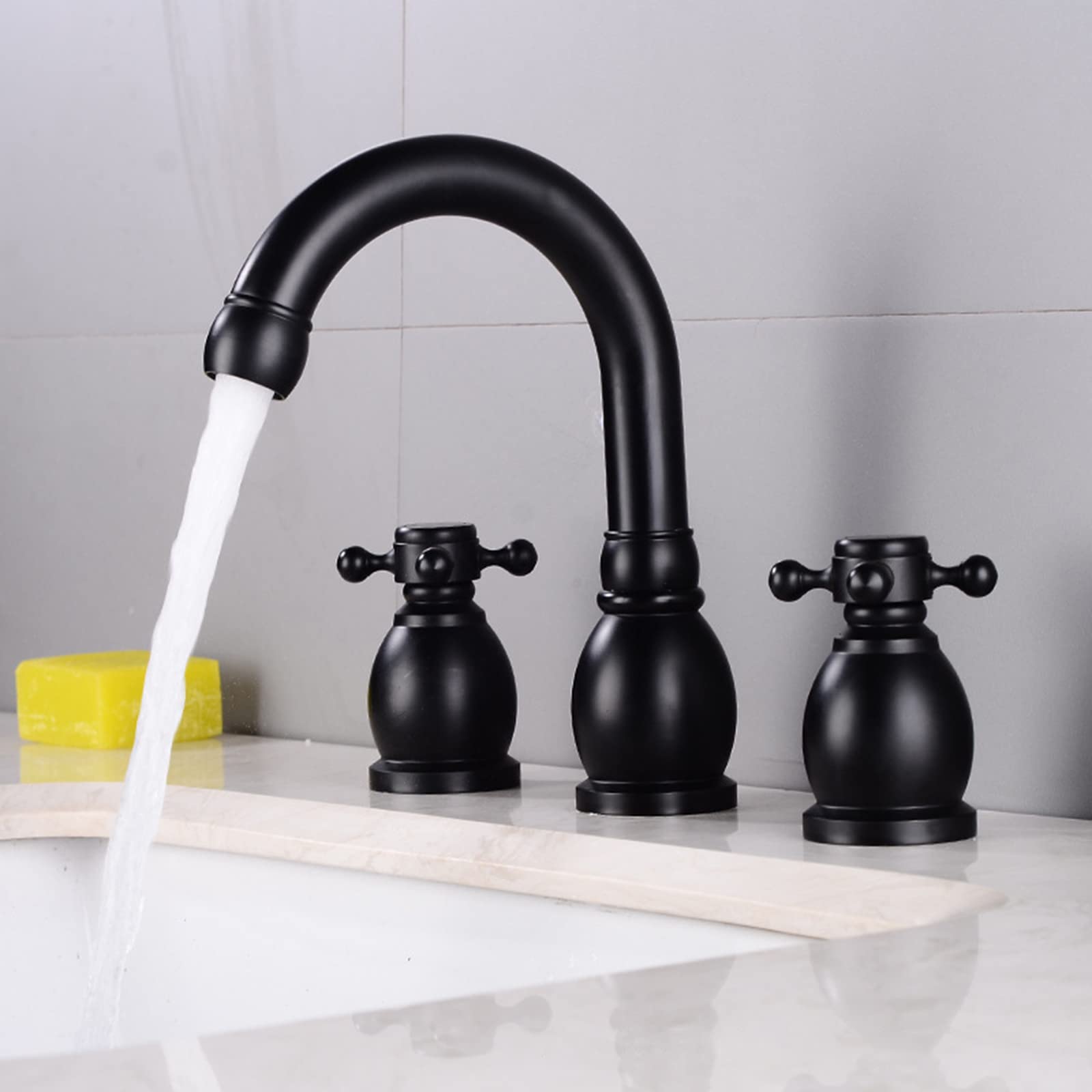Mitigeur de lavabo à double levier élimine les éclaboussures grâce au bec 360 degrés