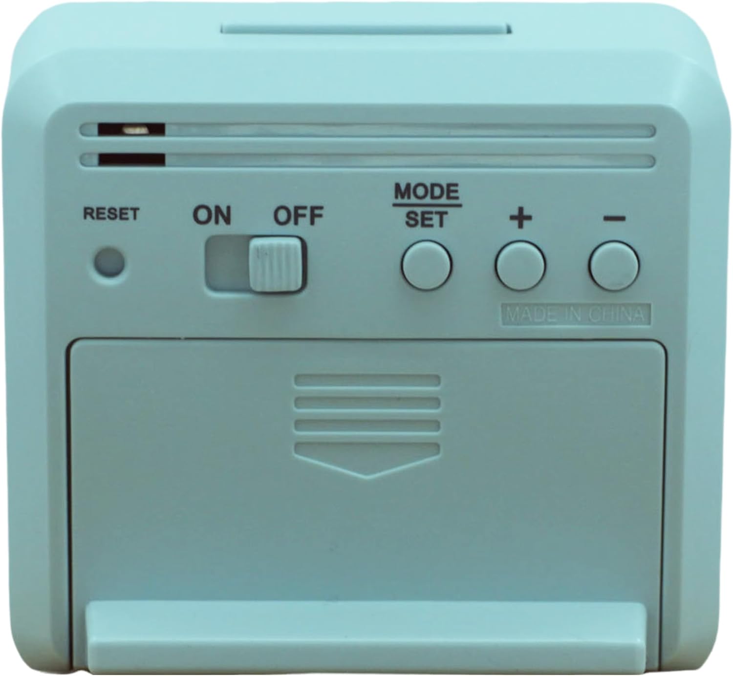 Enrere view of the Seiko Zen Digital Bedroom Alarm Clock, showing the battery compartment, reset button, ON/OFF switch, MODE/SET button, and plus/minus buttons.