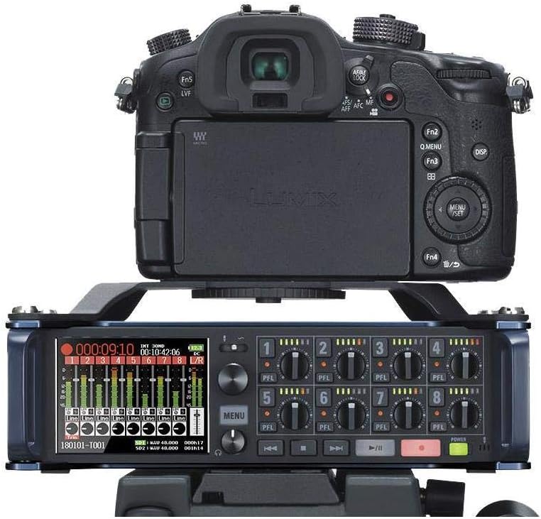 Zoom F8/F8n recorder with CMF-8 adapter mounted beneath a DSLR camera