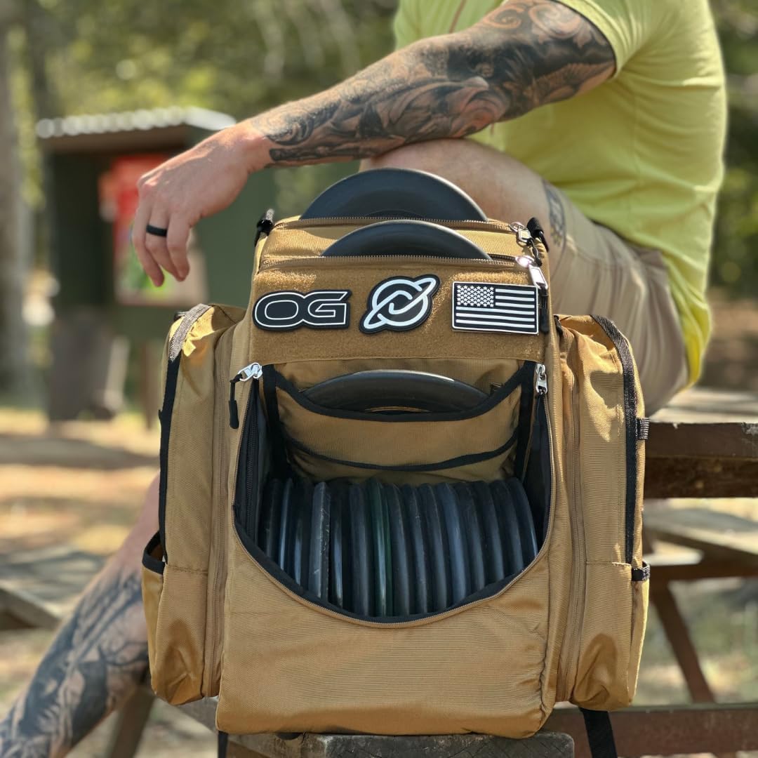 Discology Disc Golf OG V3 Disc Golf Bag | 26+ Disc Capacity | Premium Disc Golf Backpack Bag | Tough, Durable Design | 2 Large Top and Side Compartments | Top Patch Panel with Three Patchs Included