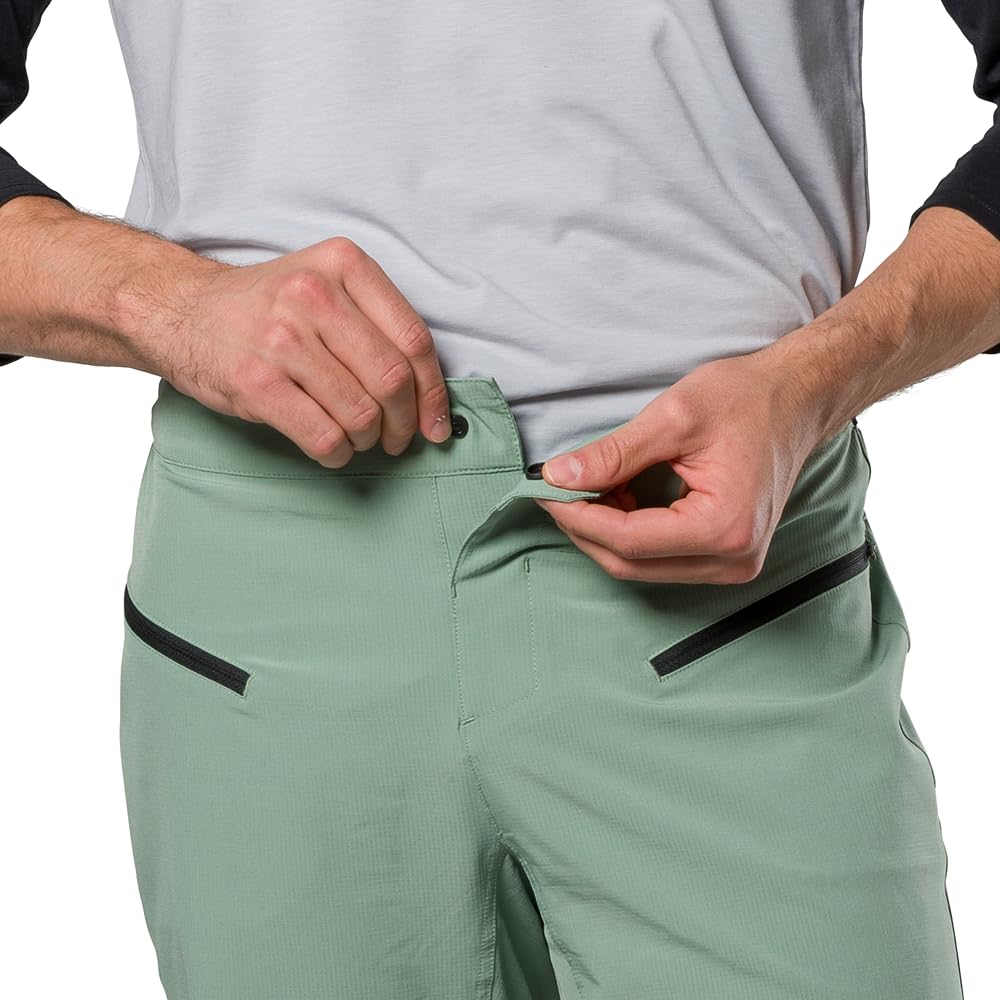 PEARL IZUMI Pantalón corto de ciclismo de montaña para hombre. Forro de gamuza desmontable y dos bolsillos con cremallera. Entrepierna cómoda y duradera de 11.5 pulgadas.