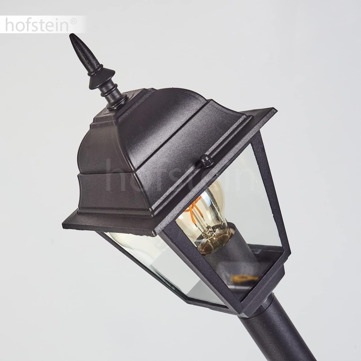 Close-up view of the lamp head with an E27 bulb installed