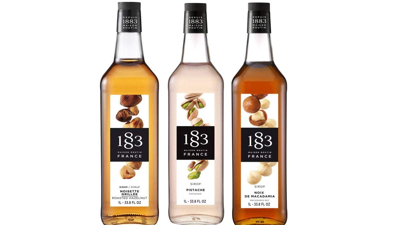 ASSORTIMENT DE FRUITS SECS : SIROPS DE NOISETTE GRILLÉE, DE PISTACHE, DE NOIX DE MACADAMIA