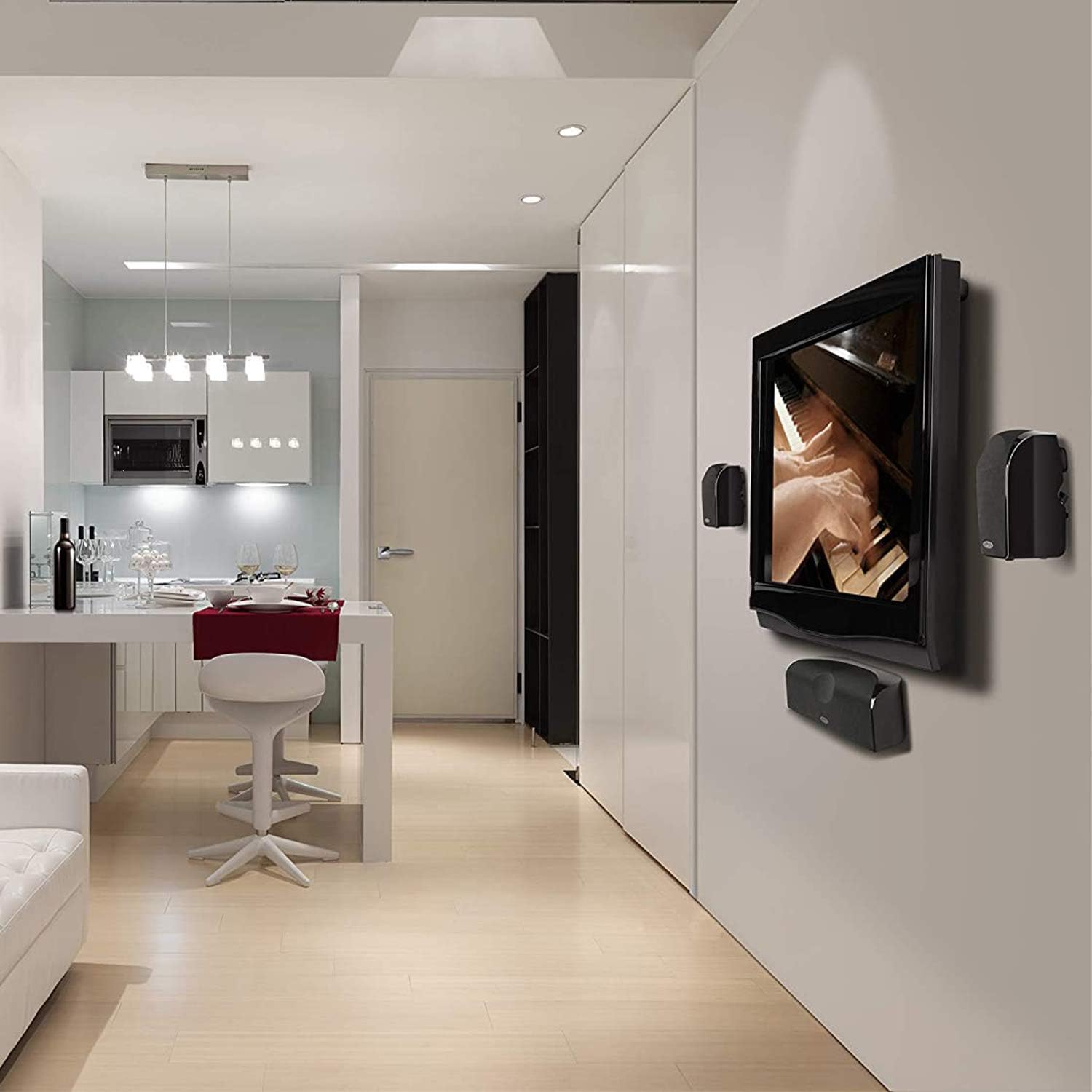 Polk Audio TL1 Satellite Speakers wall-mounted in a modern living space