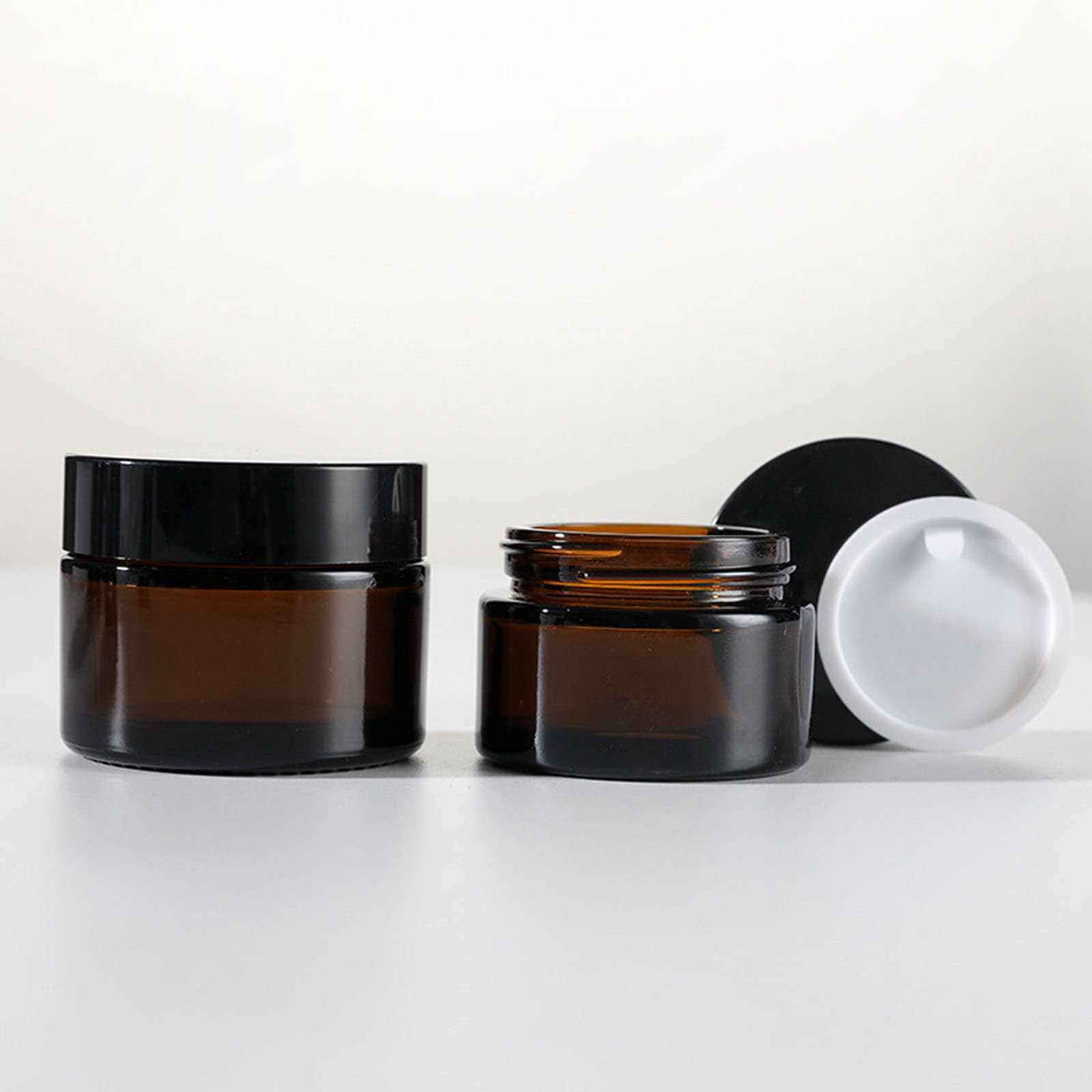 Tazweeq 15 Pcs Clear Glass Round Jars with Black Lids, 30g Capacity, Suitable for Cosmetics, Spices, Essential Oils, Creams, Lotions, Trinkets, Candles, Candied Fruit