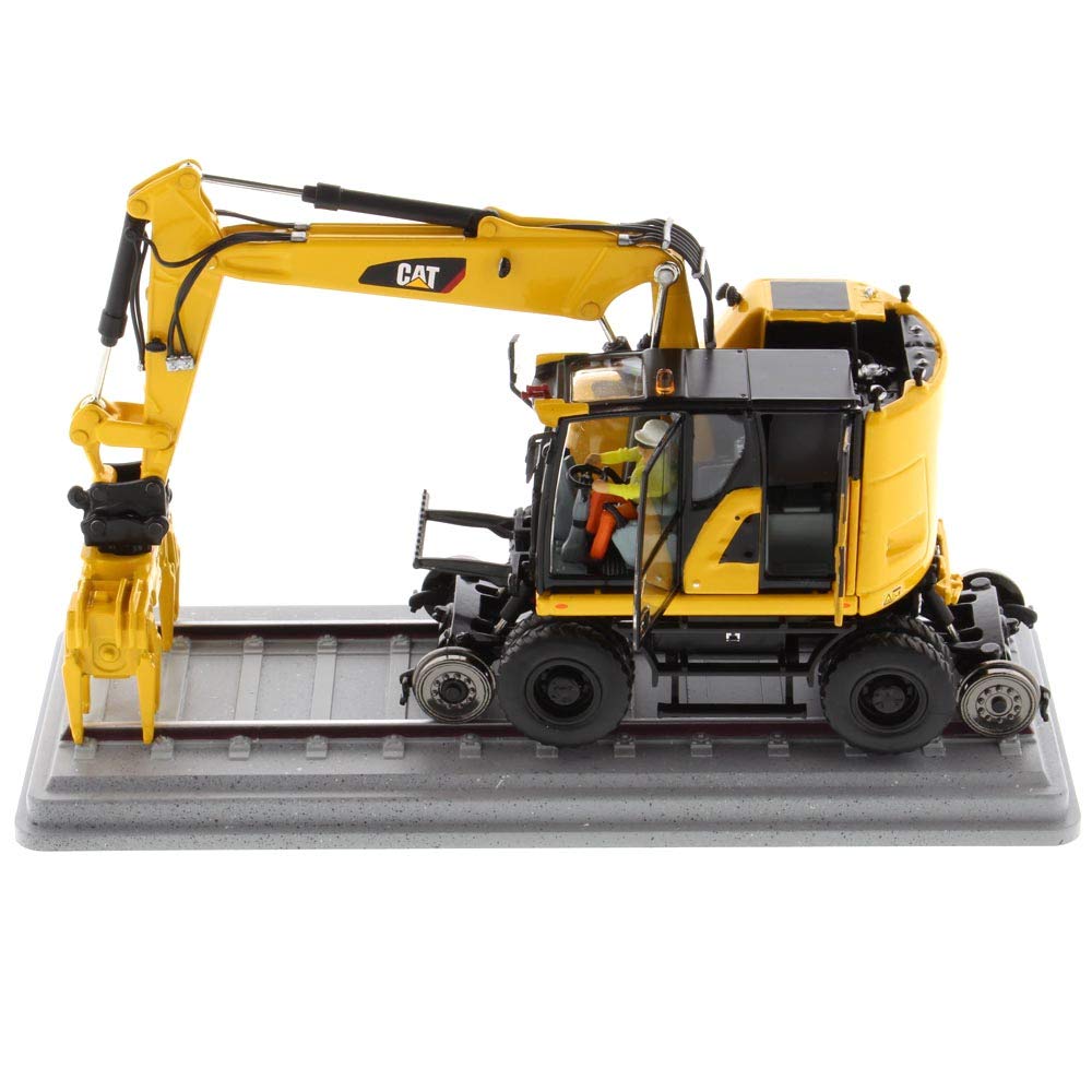 Diecast Masters 85661 - Pelle Rail-Route Caterpillar pour Chemin de Fer Cat M323F Rail, échelle 1:50, env. 6,0 x 8,3 x 16,0 cm, dès 14 Ans, Jaune