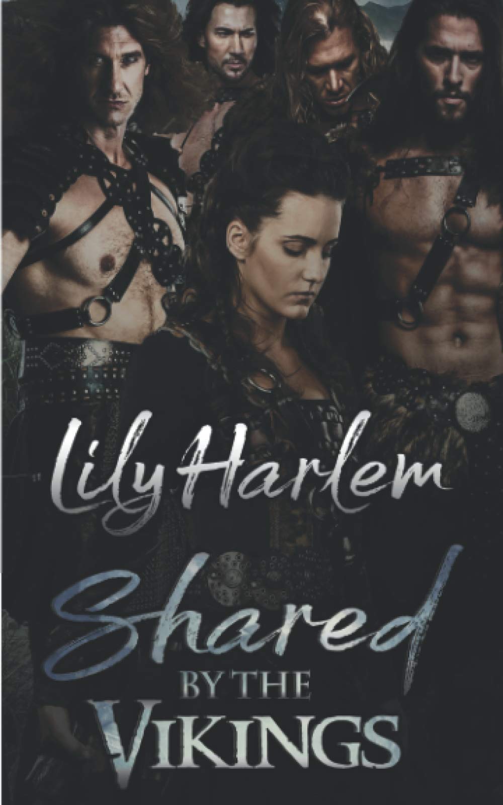 Shared by the Vikings: A Reverse Harem Romance