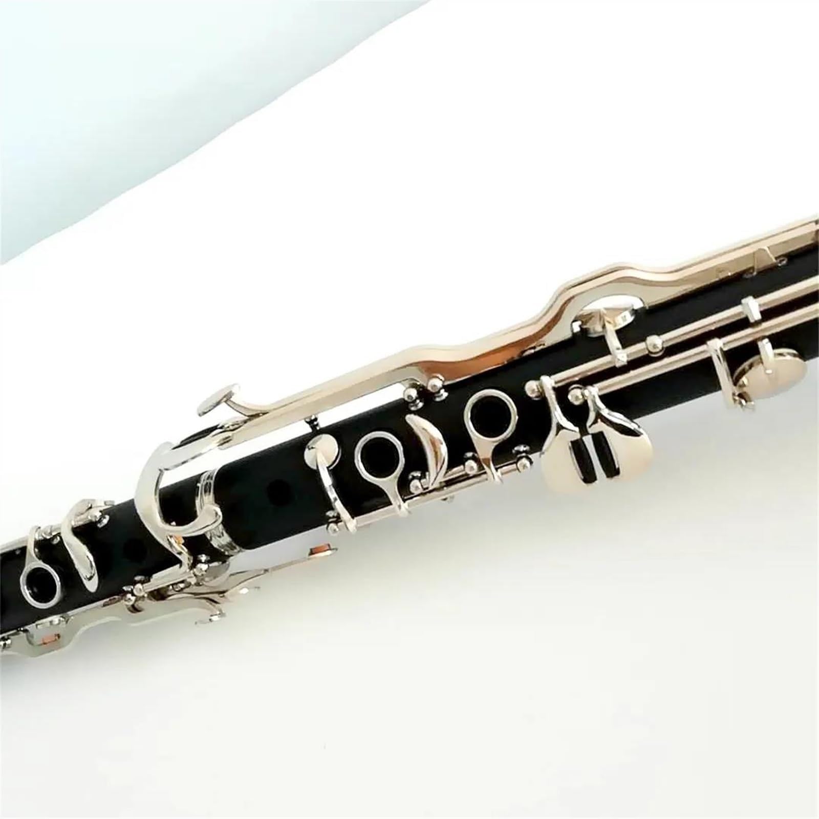 Instrumento de clarinete de 18 teclas en tecla G Cuerpo de baquelita Superficie niquelada Clarinete Profesional