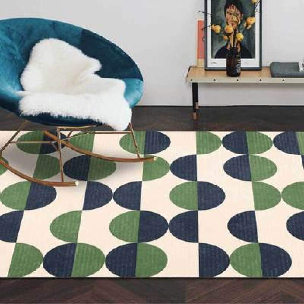Tapis de salon géométrique aux coutures vertes et cercles bleus