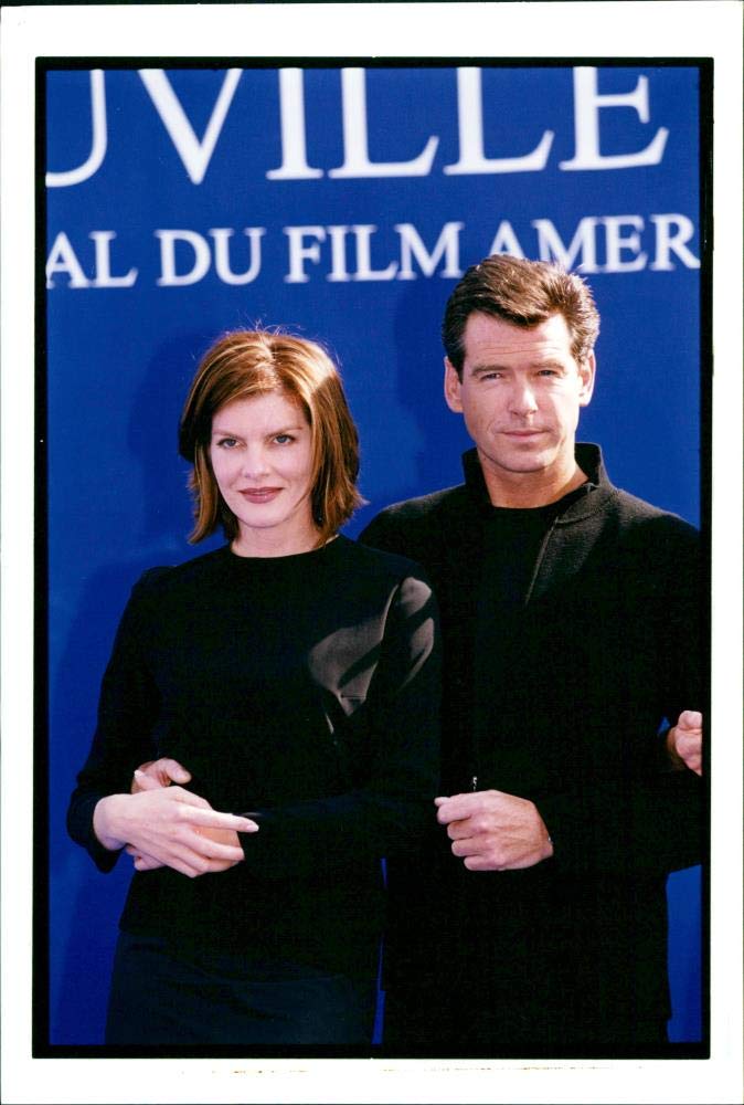 Vintage photo of Pierce Brosnan and Ren233; Russo.
