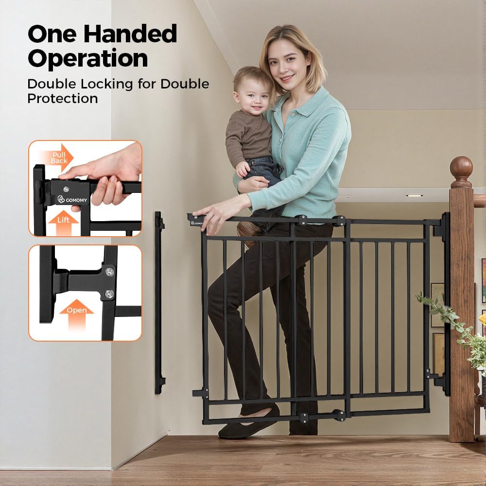 A woman holding a baby in one arm, demonstrating how to open the baby gate with a single hand by pulling back and lifting the latch mechanism.