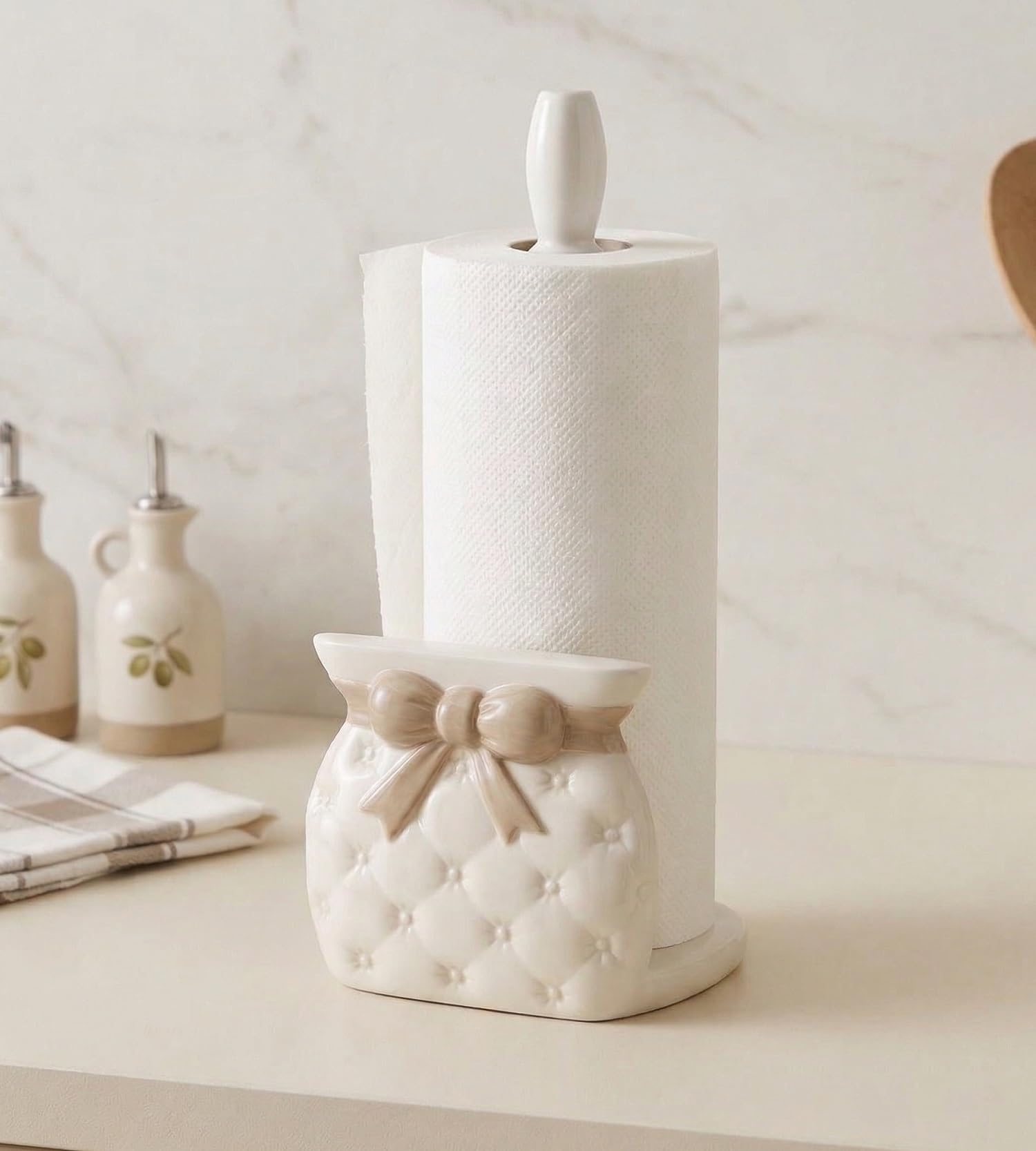 Portarrollos de cerámica blanco y gris topo para organizar el baño con estilo