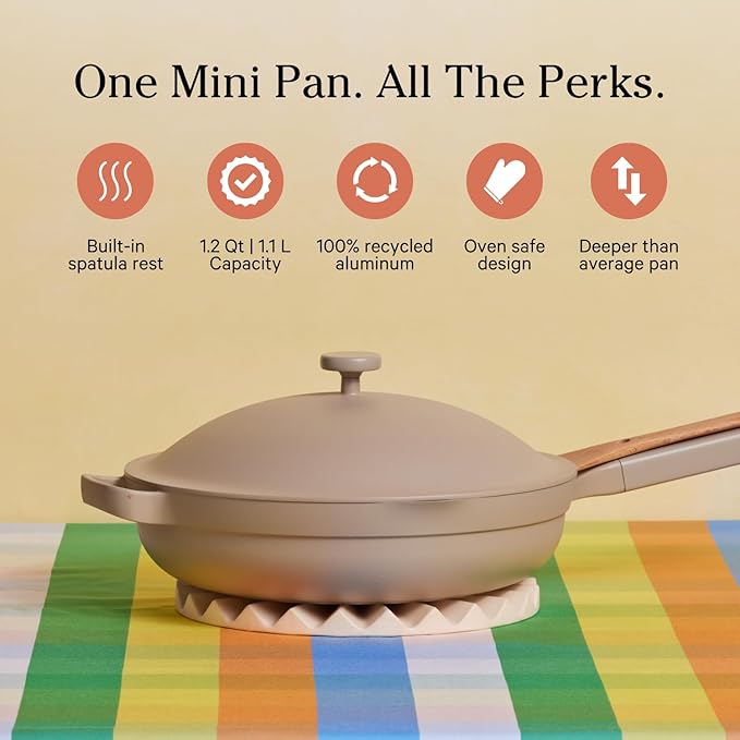 The Our Place Mini Always Pan 2.0 is a versatile piece of cookware designed to simplify your kitchen experience. Measuring 22 cm in diameter with a capacity of 1.1 liters, this pan is perfect for a variety of cooking tasks such as frying, sautéing, and steaming. Made from nonstick, toxin-free ceramic-coated aluminum, it offers a safe cooking surface that prevents food from sticking, making it easy to clean and maintain. This pan embodies a 10-in-1 design, aiming to replace numerous traditional kitchen tools by allowing you to braise, sear, steam, strain, sauté, fry, boil, serve, store, and even bake.