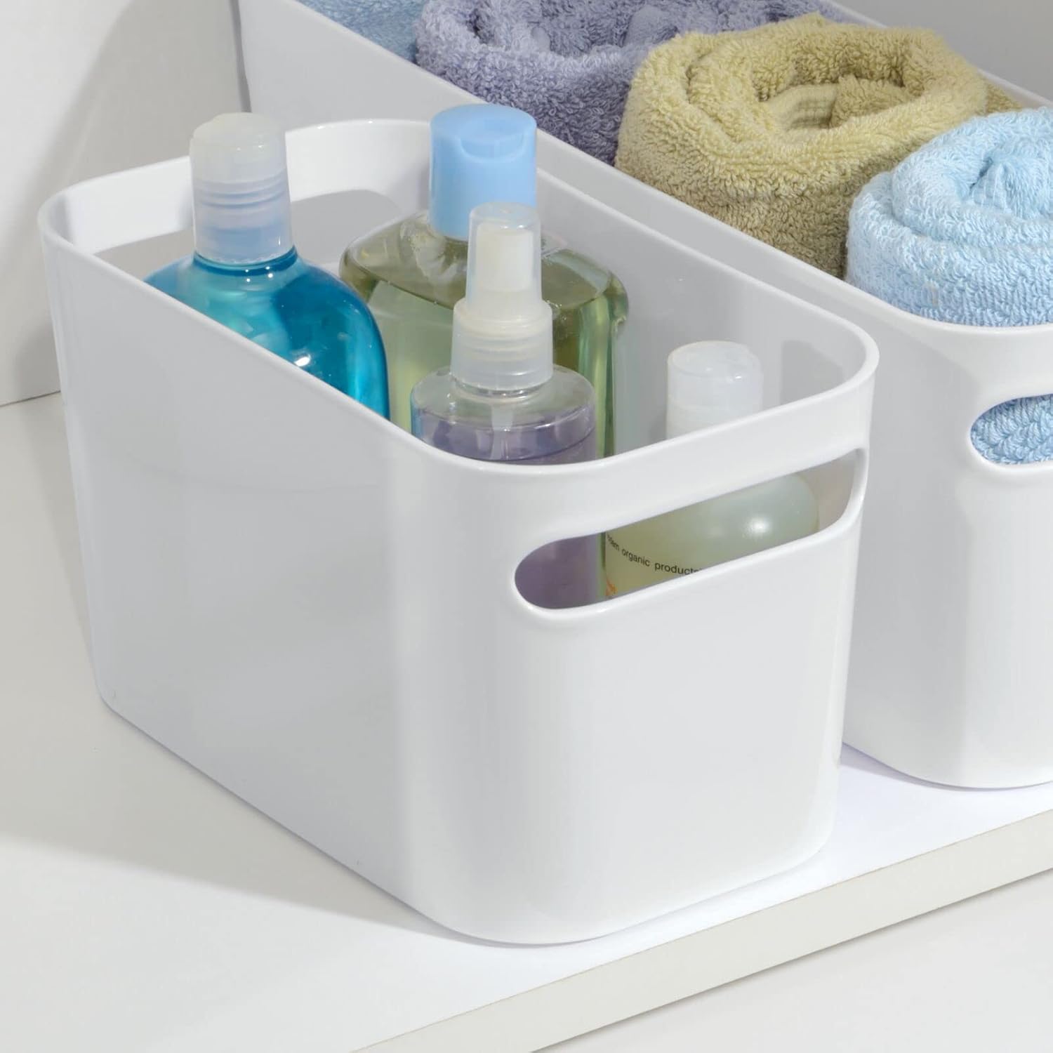 mDesign Deep Plastic Bathroom Bin with Handles - Storage Organizer for Vanity Countertop - Hold Soap, Body Wash, Shampoo, Lotion, Conditioner, Hand Towels - 10" Long, Aura Collection, 2 Pack, White