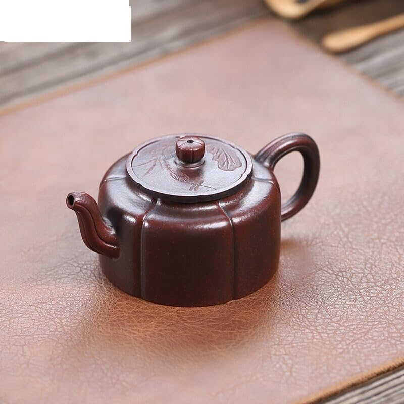 Tetera de arcilla morada artesanal con diseño elegante para té 3