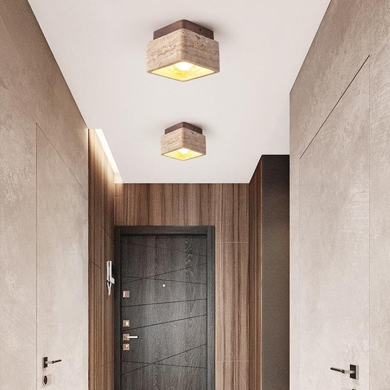 Plafonnier LED travertin jaune pour illuminer une allée sombre