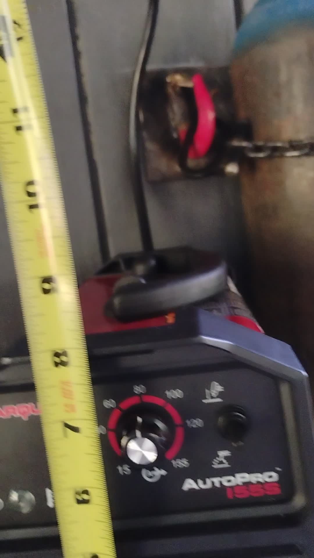 Measuring the dimensions of the Lincoln Electric Autopro 155S Welder