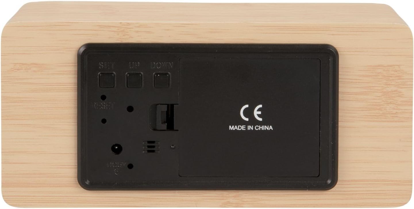 පසුපස view of the Karlsson LED Mirror Alarm Clock showing the control buttons and battery compartment.