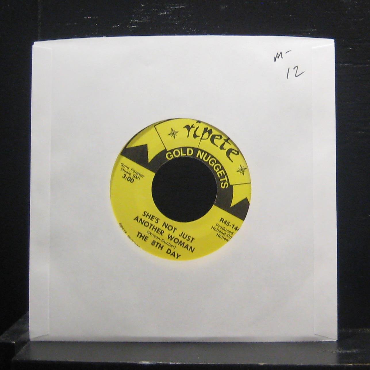 She's Not Just Another Woman / Band Of Gold - 7" Vinyl 45 Record