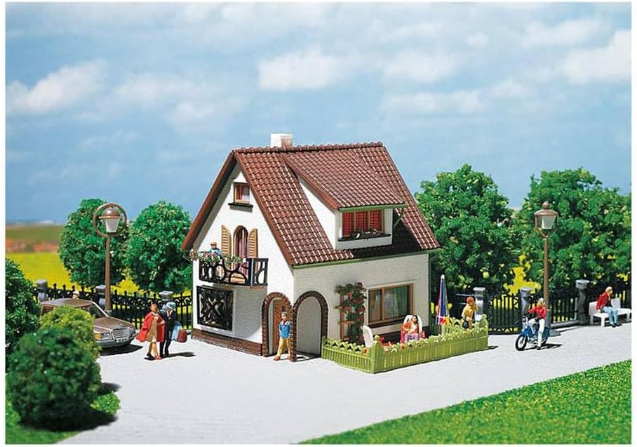 Faller 130200 Stucco House with Dormer integrated into a model railway diorama