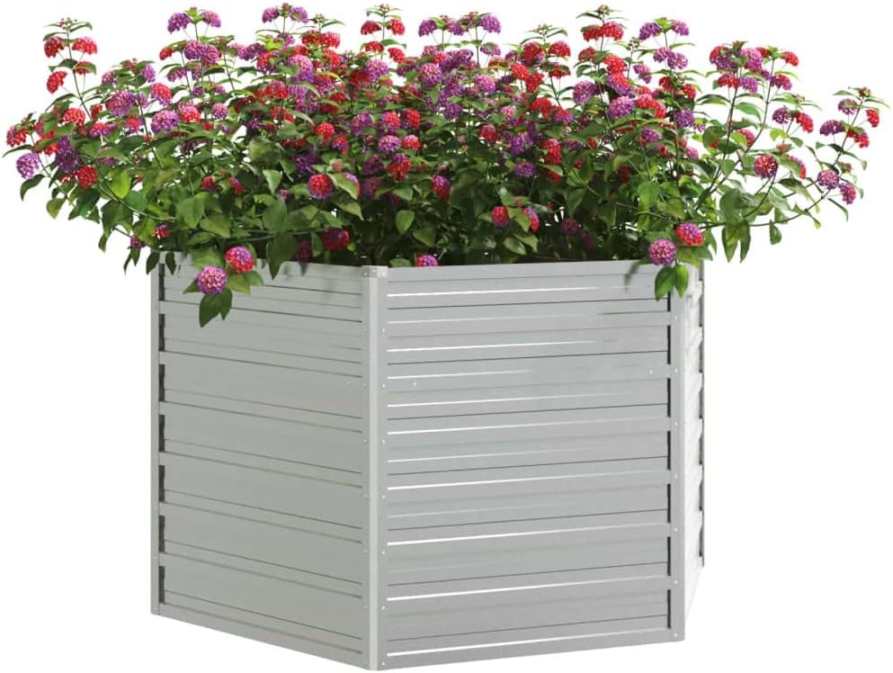 Assembled silver galvanised steel raised garden bed, filled with vibrant flowering plants, against a plain background.