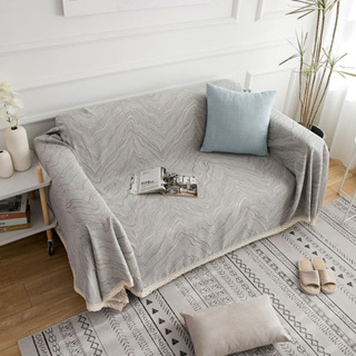 Housse de protection pour canapé style serviette pour un salon chaleureux et accueillant en famille