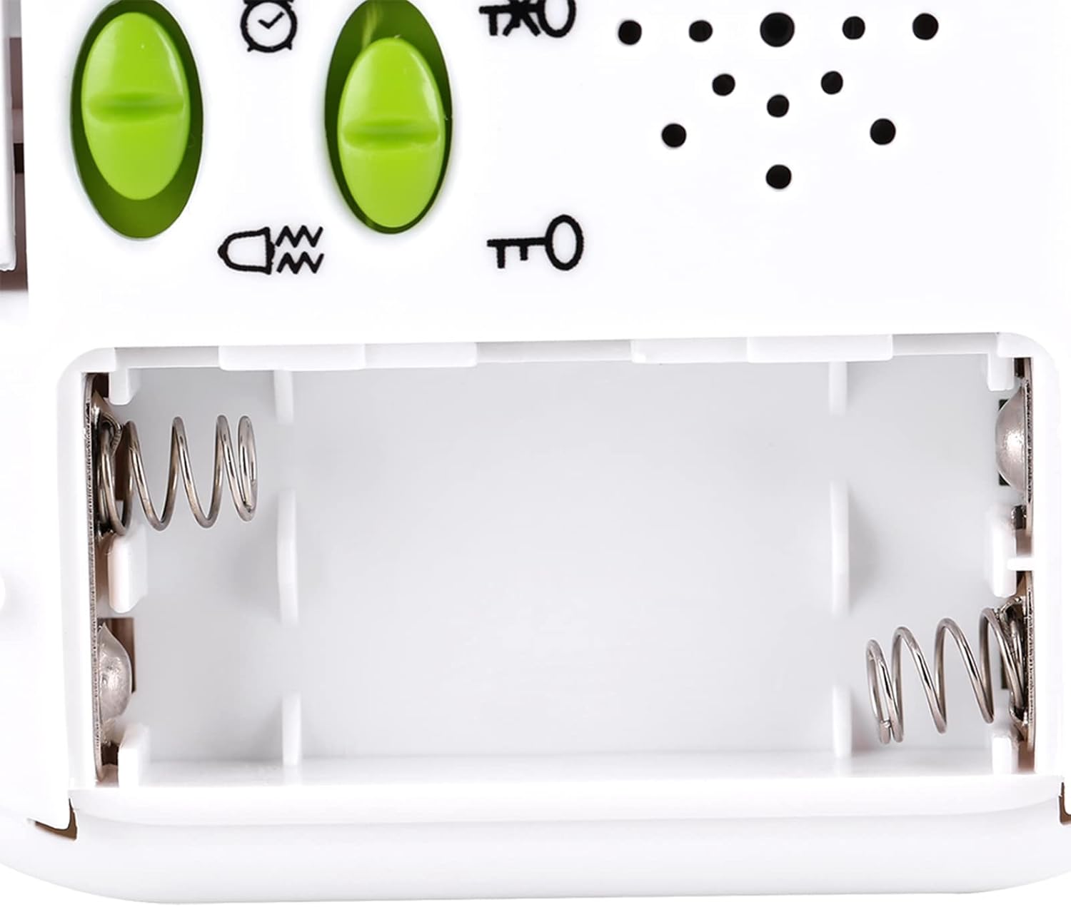 Open battery compartment of the Yosoo Digital Alarm Clock, showing the two AAA battery slots.