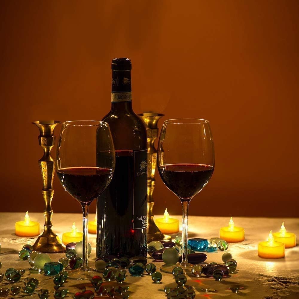 Tappovaly Battery Operated LED Tea Lights:200 Pack Flameless Votive Candles Lamp Realistic and Bright Flickering Long Lasting 200Hours for Wedding Holiday Party Home Decoration (Warm Yellow)