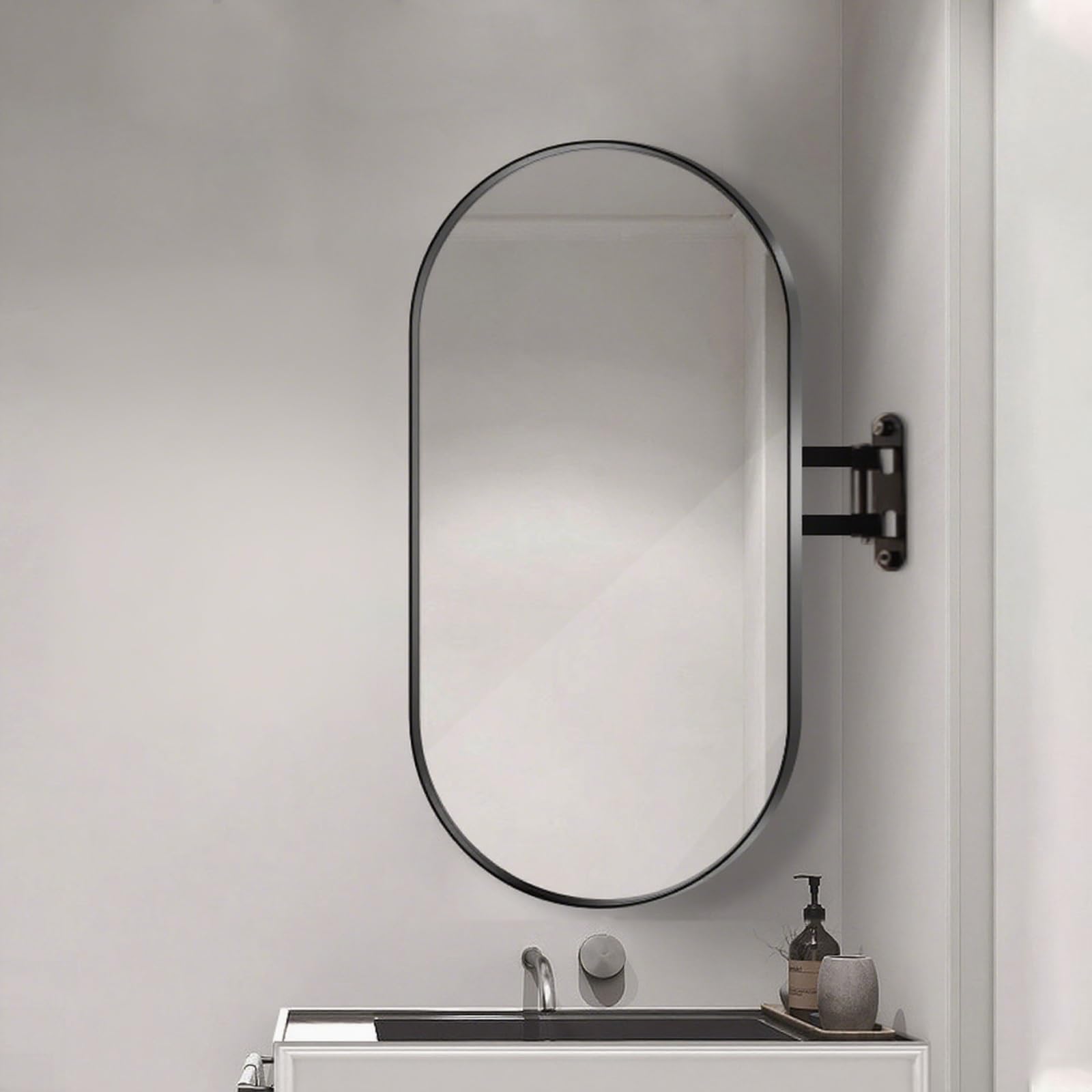 Miroir rotatif et rétractable ovale noir au design suspendu minimaliste