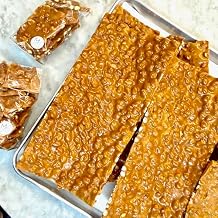 Gourmet Handmade Old Fashion Peanut Brittle Candy. Two 10 oz candy bags of buttery and crunchy Honey Roasted Peanut Brittle candy. An ideal gift for any occasion
