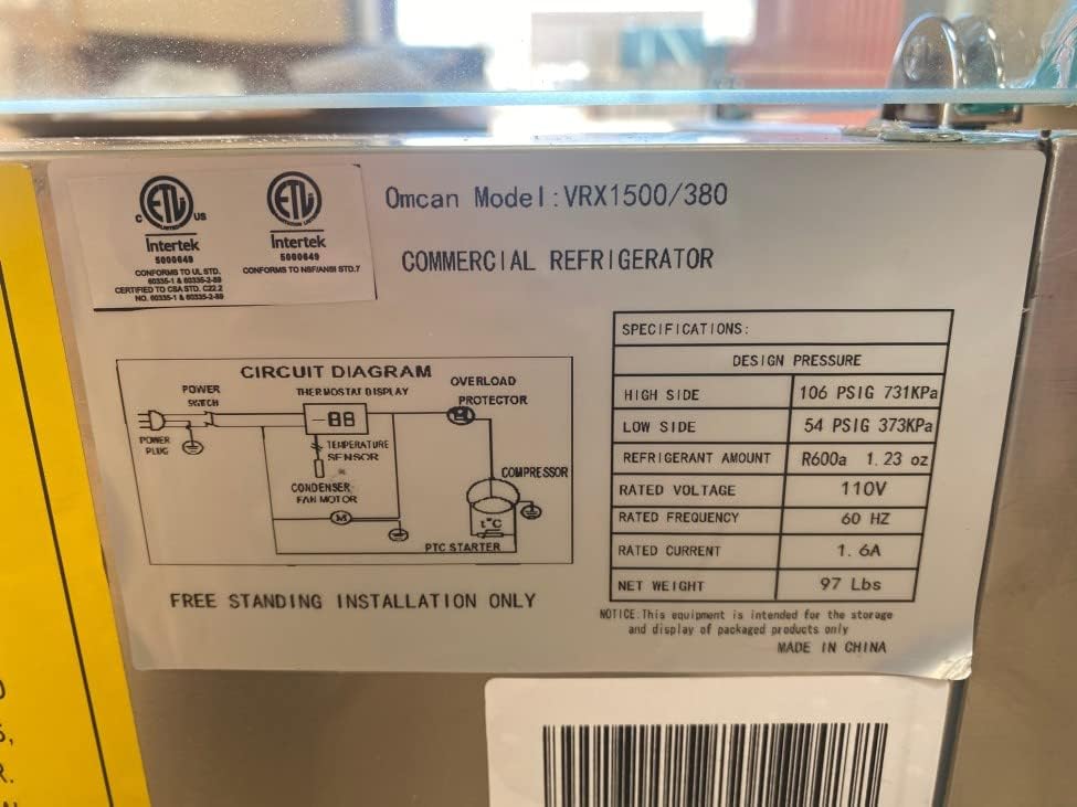 Close-up of the specification label for the Omcan Model VRX1500/380 commercial refrigerator, detailing electrical, refrigerant, and design pressure specifications.