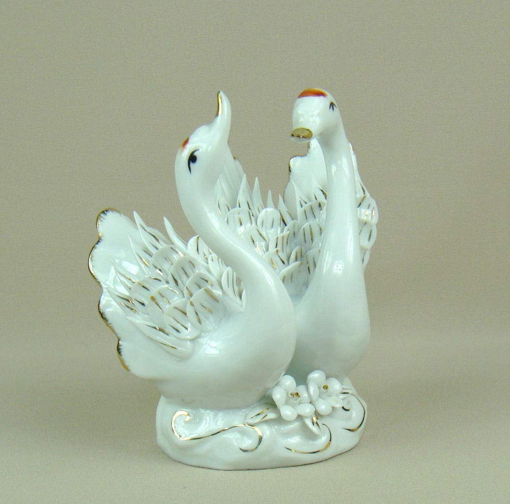 Sculpture cygne en porcelaine artisanale pour une décoration de maison raffinée