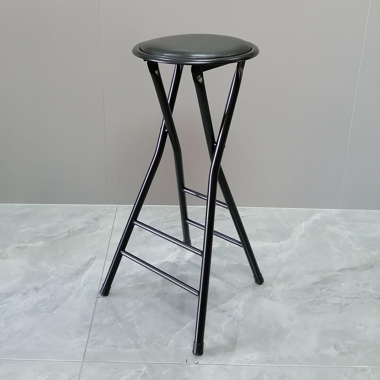 Tabouret de bar pliable en métal robuste au design compact et stable