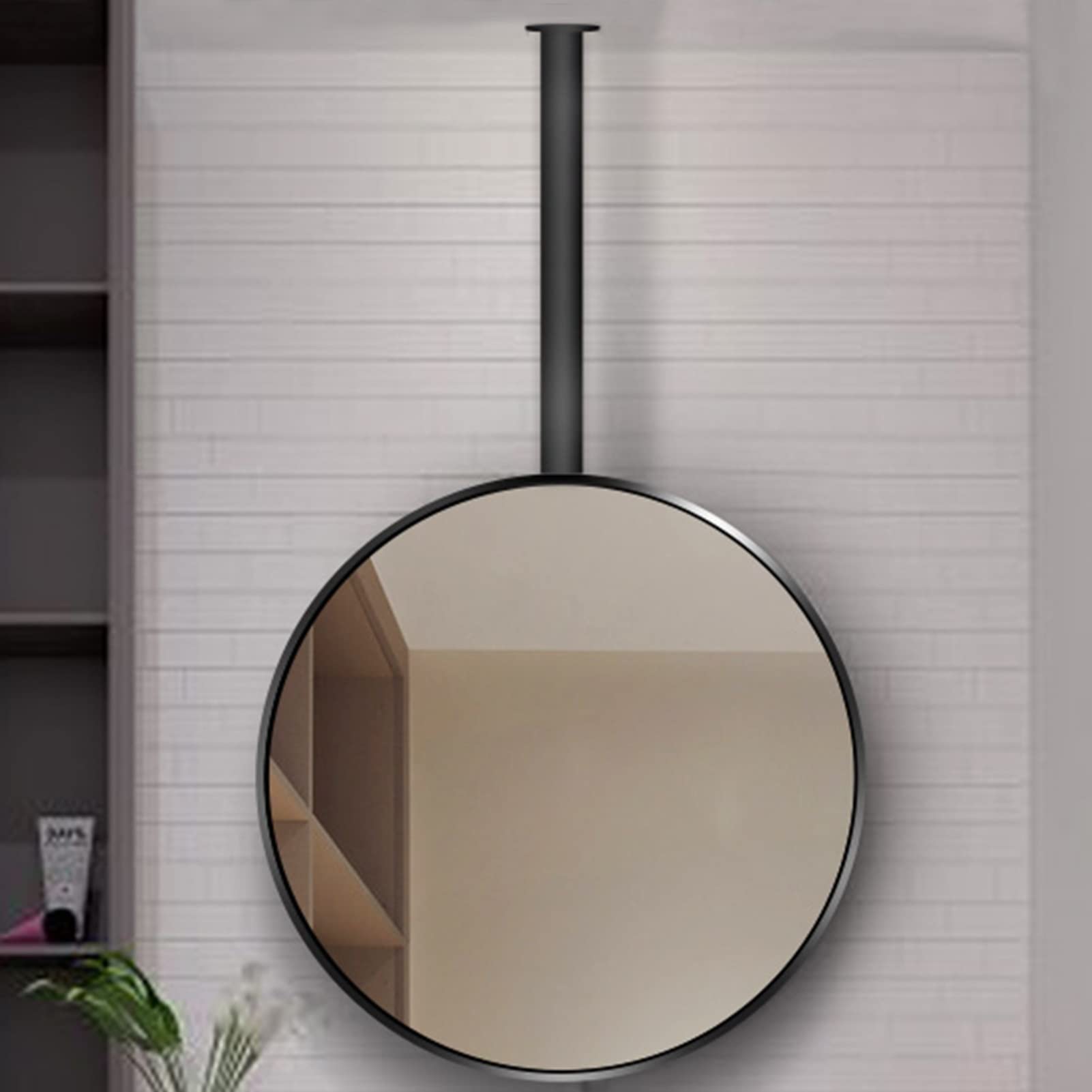 Miroir rond à tige suspendue pour sublimer votre salle de bain