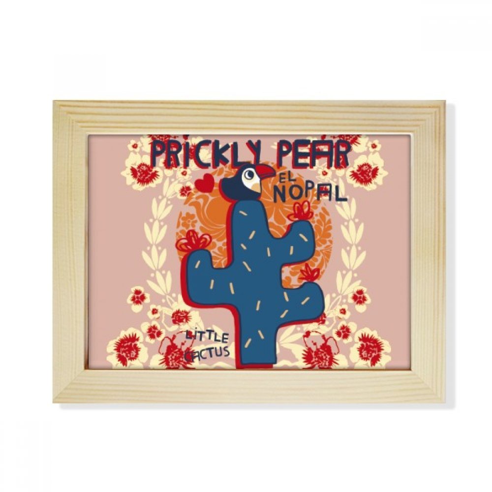Cactus y suculentas en marco de madera para decorar tu mesa de oficina con arte botánico